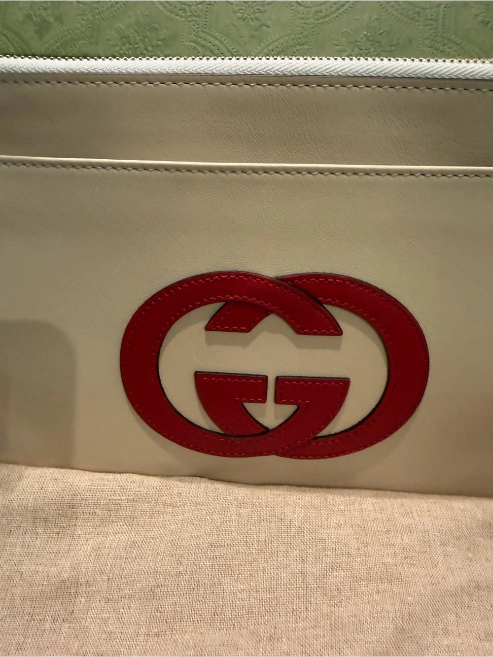Authentic Gucci Cream Leather Zip Pouch with Red Double G Logo